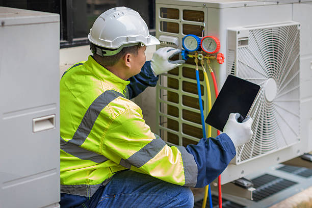 Professional Air Conditioning Repair technician working in Roslyn, NY